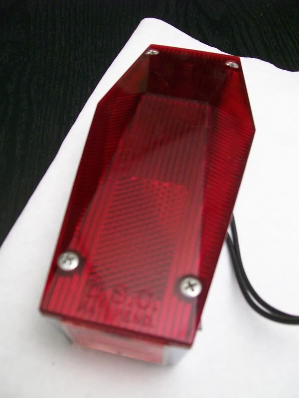 Tell me about this Iron Cross Tail Light D.S.C. The Jockey Journal Board