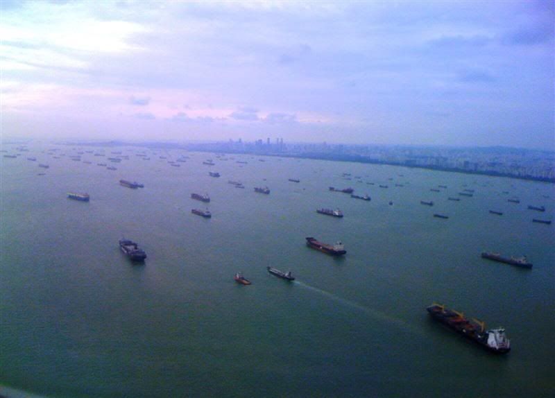 This widely circulated photo shows hundreds of idle containerships in Singapore last year.