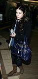 michelle-trachtenberg-lax-airport-los-angeles-april-21-2009-paparazzi-hq-04.jpg