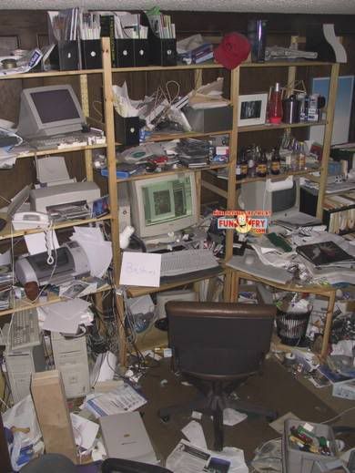 messy_computer_desk_printers_monito.jpg