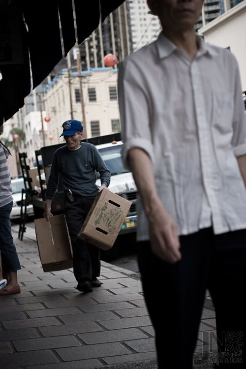 IMAGE: http://i96.photobucket.com/albums/l192/jnakatsu/2-6-2008-Man-With-Boxes.jpg